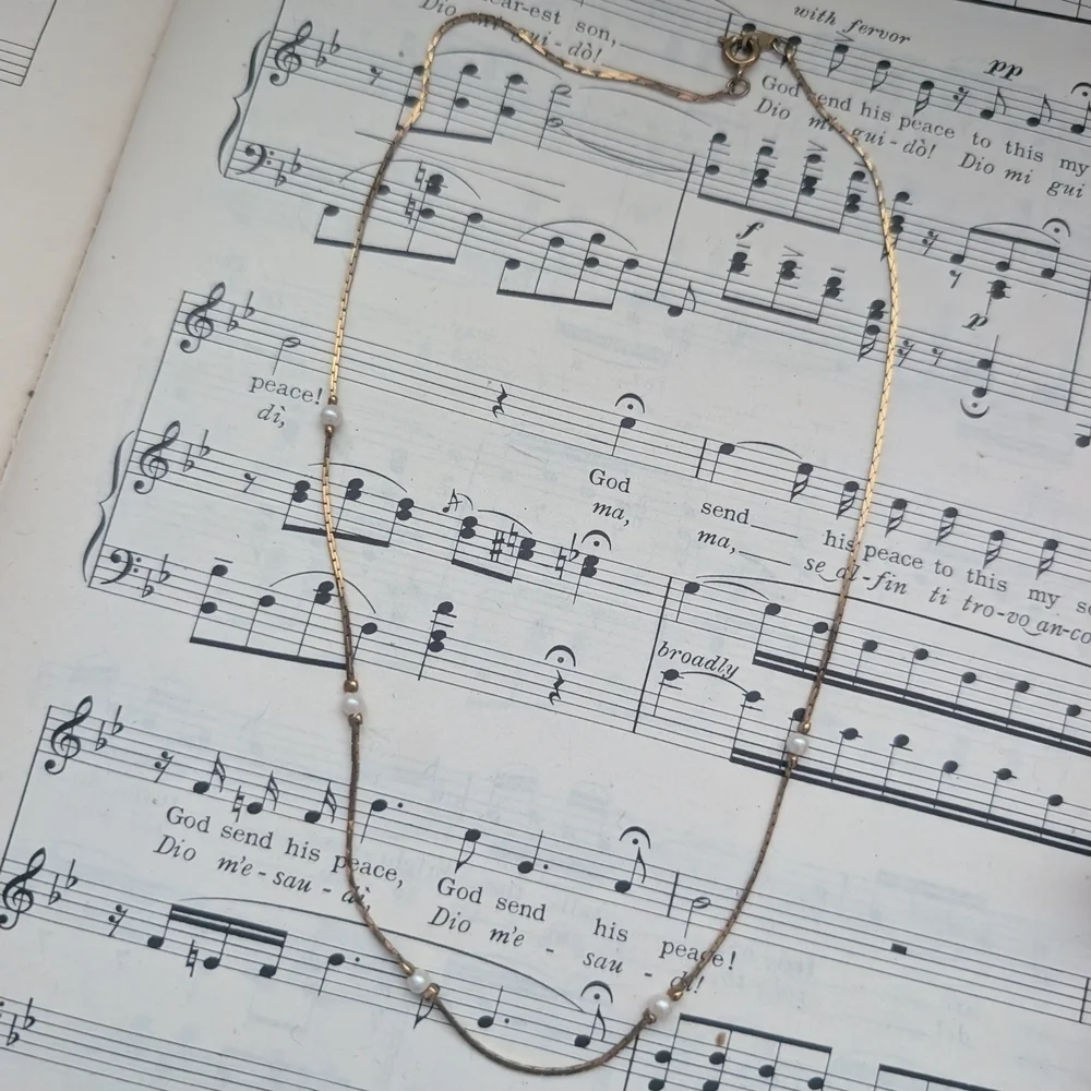 Elegant Gold Necklace with Pearl Accents - Picture 10 of 10